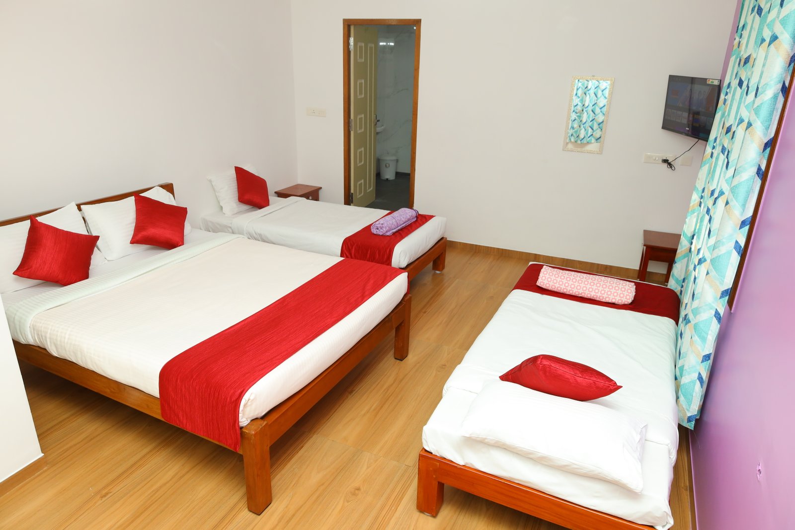 Three bedded room interior at La Villa Le Bonheur